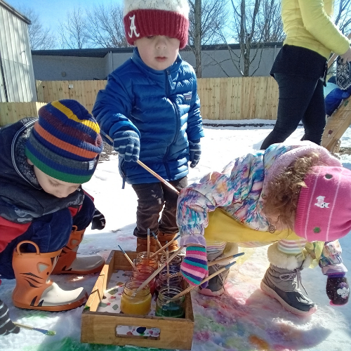 children painting on snow
