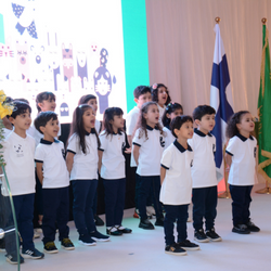 children singing Saudi opening ceremony